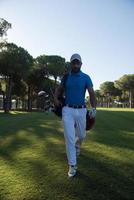 golf player walking photo