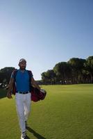 golf player walking photo