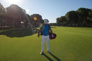 golf player walking photo