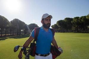 golf player walking photo