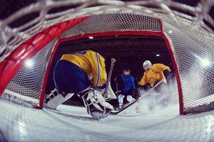 portero de hockey sobre hielo foto