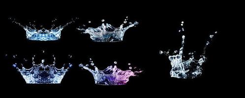 Collection of splashing water on a black background photo