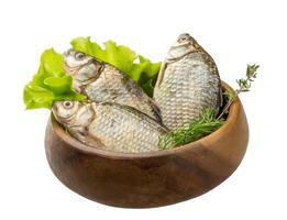 Crucian fish in a bowl on white background photo