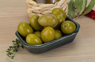 Marinated green olives photo