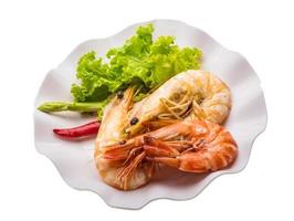 Boiled king prawns Tiger prawn on the plate and white background photo