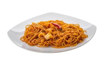 Seafood pasta on the plate and white background photo