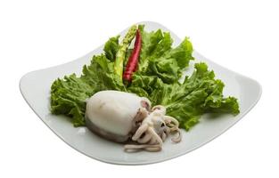 Boiled cuttlefish on the plate and white background photo