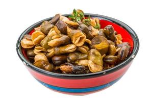 Broad beans in a bowl on white background photo