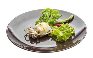 Grilled cuttlefish on the plate and white background photo