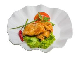 Baracuda steak on the plate and white background photo