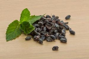 Berberis on wooden background photo