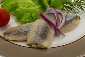 Herring fillet on the plate photo