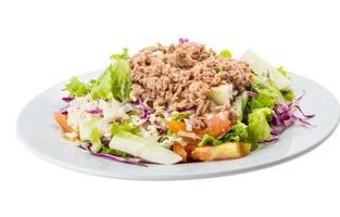 Tuna salad on the plate and white background photo