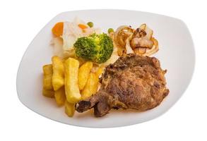 T-bone steak on the plate and white background photo