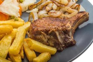 T-bone steak on the plate photo