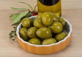 Marinated green olives photo