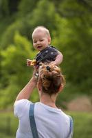 woman with baby  in nature photo