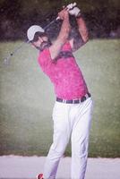 golfer hitting a sand bunker shot photo