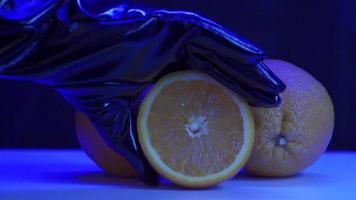 Cutting ripe oranges on board close-up. Orange citrus fruits, making fresh juice or tropical cocktails. video