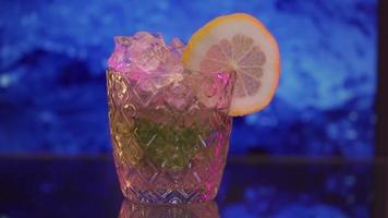 Refreshing soft drink Lemon and sparkling water with ice. video