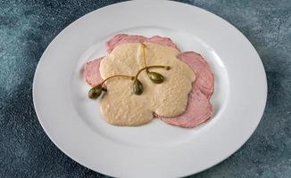 Vitello tonnato - cold, sliced veal photo