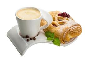 Coffee with pastry on white background photo