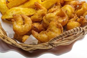 Seafood basket in a basket on white background photo