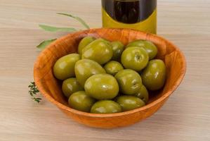 Marinated green olives photo