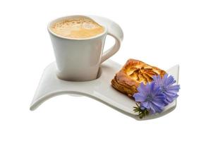 Coffee with pastry on white background photo