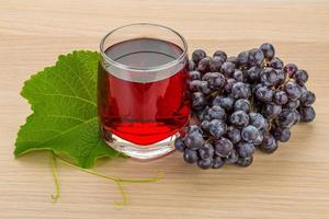 Grape juice and berries photo