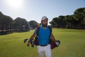 golf player walking photo