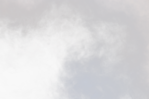 Dense Fluffy Puffs of White Smoke and Fog on transparent png Background, Abstract Smoke Clouds, Movement Blurred out of focus. Smoking blows from machine dry ice fly fluttering in Air, effect texture