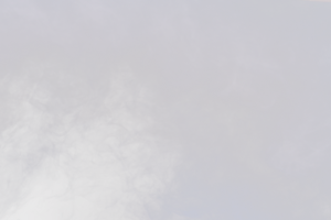 Dense Fluffy Puffs of White Smoke and Fog on transparent png Background, Abstract Smoke Clouds, Movement Blurred out of focus. Smoking blows from machine dry ice fly fluttering in Air, effect texture