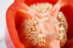 Close up red pepper bell background - bell pepper sliced or fresh sweet pepper seed photo