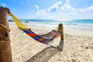 Beach hammock on sand sea waves water and coast seascape - View of beautiful tropical landscape beach sea island with ocean blue sky background in Thailand summer beach vacation relax photo