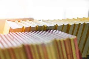 Education learning concept - books on bookshelf in the library bookshelves in school study class room background photo