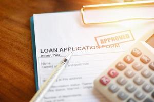 Financial loan calculator or lending for car and home loan application agreement - Loan approval concept photo