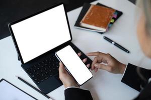 A Woman hand holding smartphone device with blank screen. Blank screen for your advertising. photo