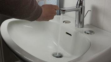 Unrecognisable man washing hands video