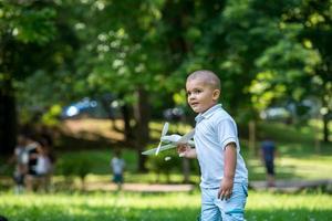 boy with airpane toy photo