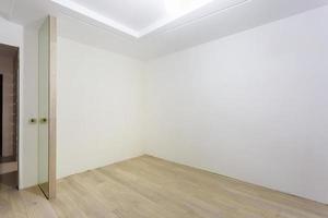 Empty unfurnished room with minimal preparatory repairs. interior with white walls photo