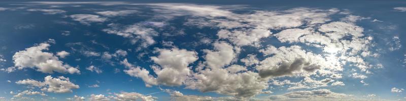 blue sky hdri 360 panorama with white beautiful clouds in seamless projection with zenith for use in 3d graphics or game development as sky dome or edit drone shot for sky replacement photo