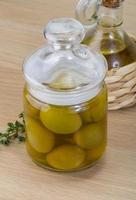 Marinated green olives photo