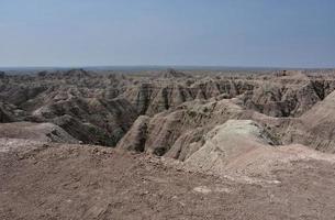 Sedimentary Sandstone Landscape in the Arid Badlands photo