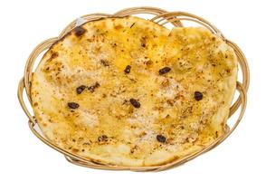 Pishwary naan in a basket on white background photo