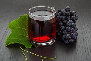 Grape juice and berries photo