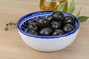 Cooked black olives photo