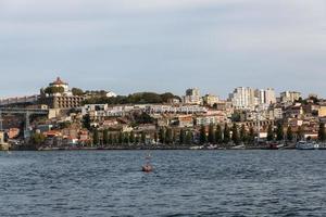 View of Porto city at the riverbank photo