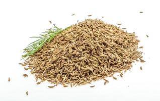 Caraway heap on white background photo