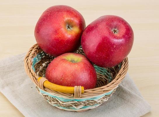 Red apples in a basket